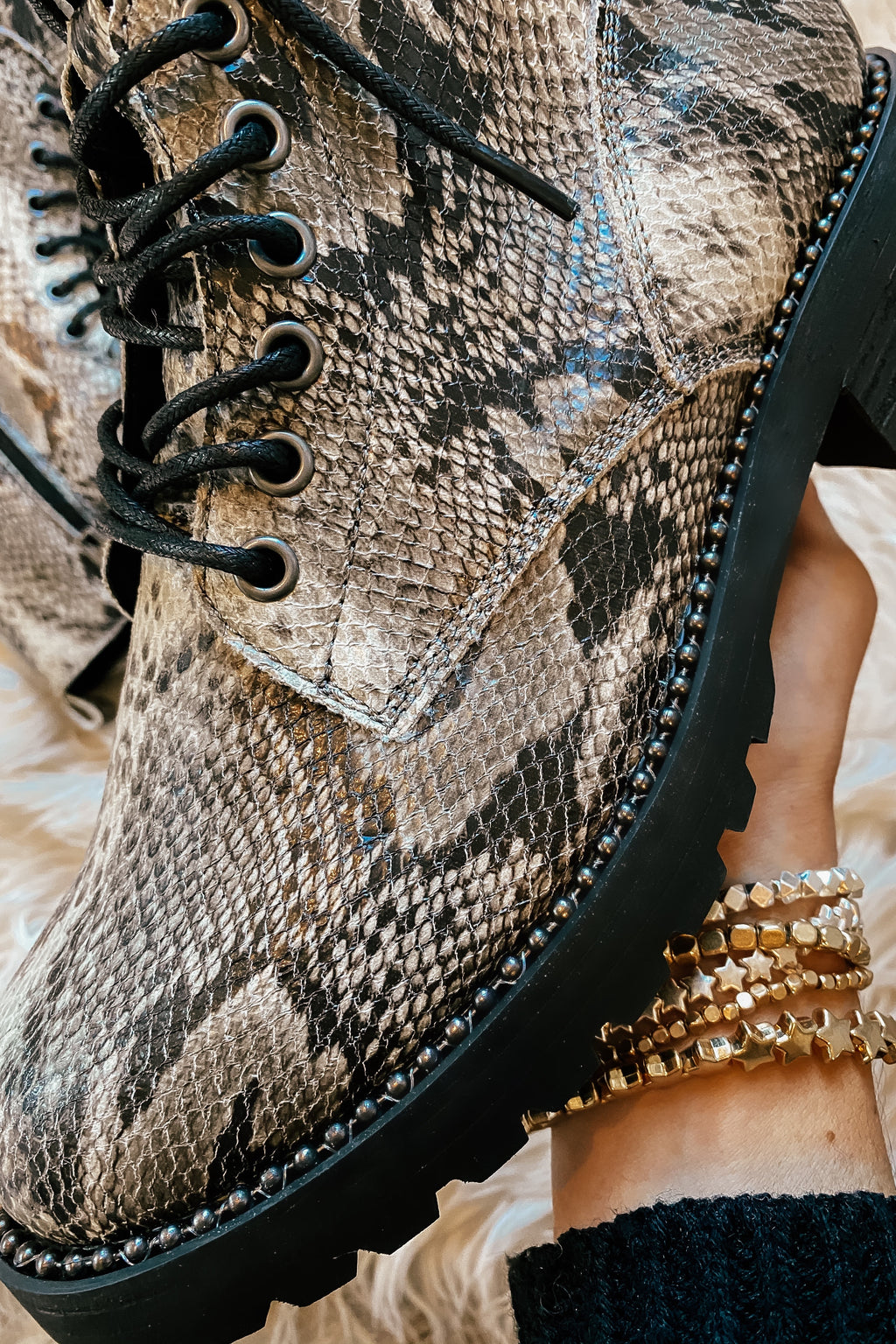 The Conquest Snakeskin Combat Boots
